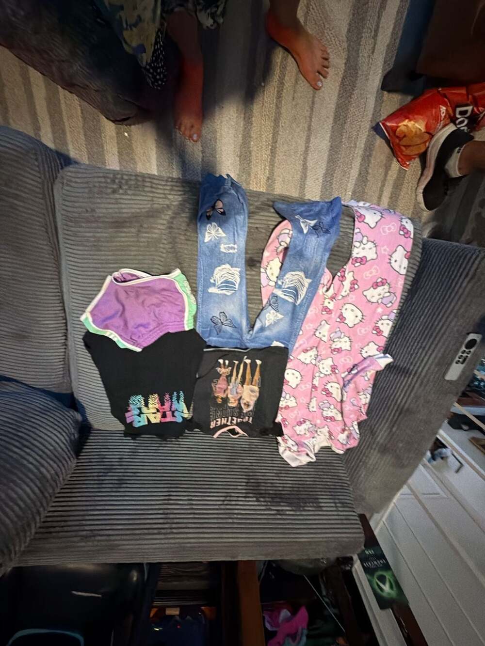 Girls Assorted Clothing Bundle: Star Wars Graphic Tee, Hello Kitty Pants, and Bu